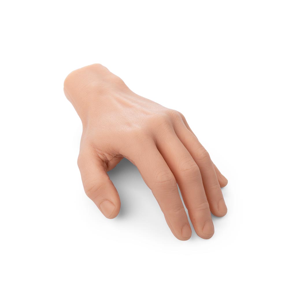 A Pound of Flesh Silicone Synthetic Left Hand with Wrist in Fitzpatrick Tone 3 angled downward on white background, full size