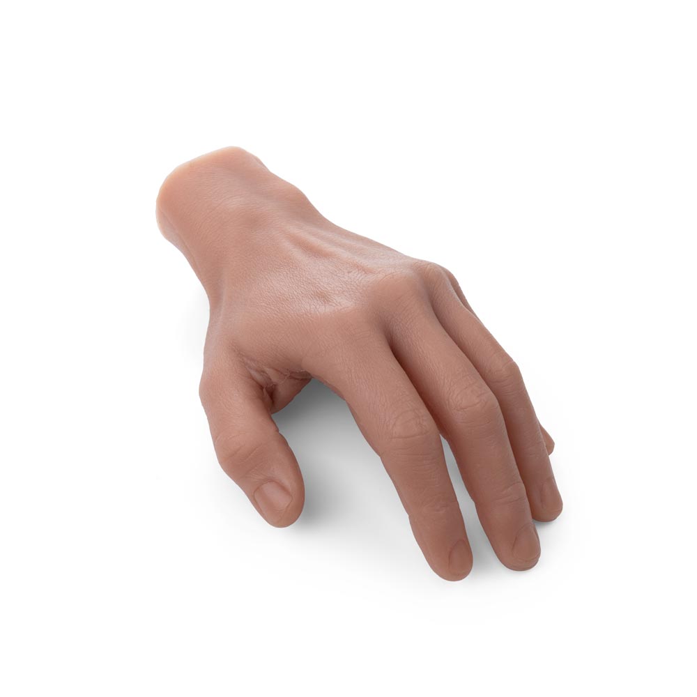 A Pound of Flesh Silicone Synthetic Left Hand with Wrist in Fitzpatrick Tone 3 angled downward on white background, full view