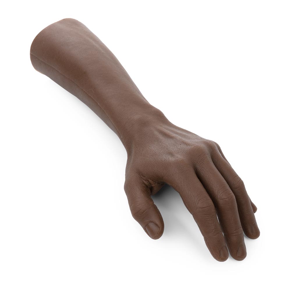 A Pound of Flesh tattooable arm and hand in Fitzpatrick skin tone 5 lying flat